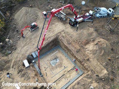 Drone image - pouring concrete at work site 4a